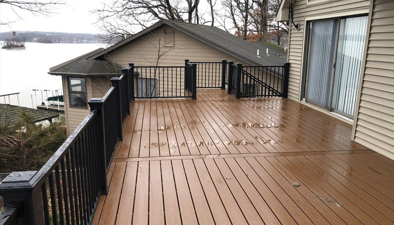 Great Deck with Select Saddle decking and Black Transcend Railing done in Gravois Mills, MO at Lake of the Ozarks