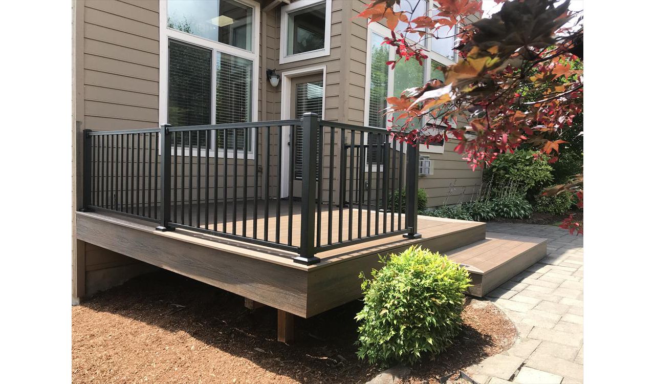 Trex Spiced Rum oasis featuring Trex Signature railing. Happy Valley, Oregon