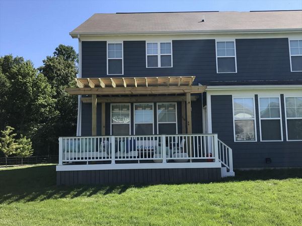 Trex deck with cocktail rail and pergola in Noblesville