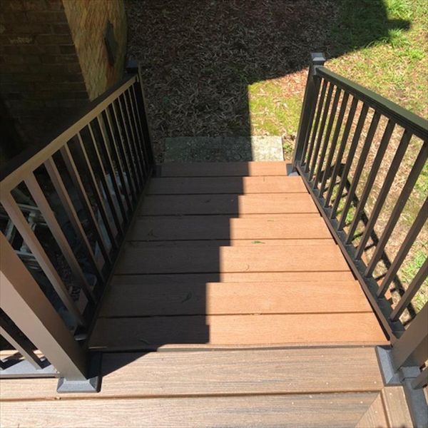 New Trex Transcend Treehouse stairs & Signature Black rails gives a safe way to get up on this great deck