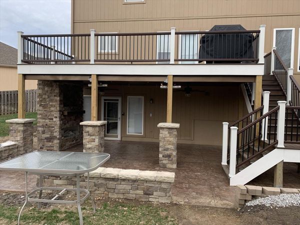 Trex Transcend Tropical (Spiced Rum) Deck with Trex Railing, Fascia and Lights - View of deck from straight on