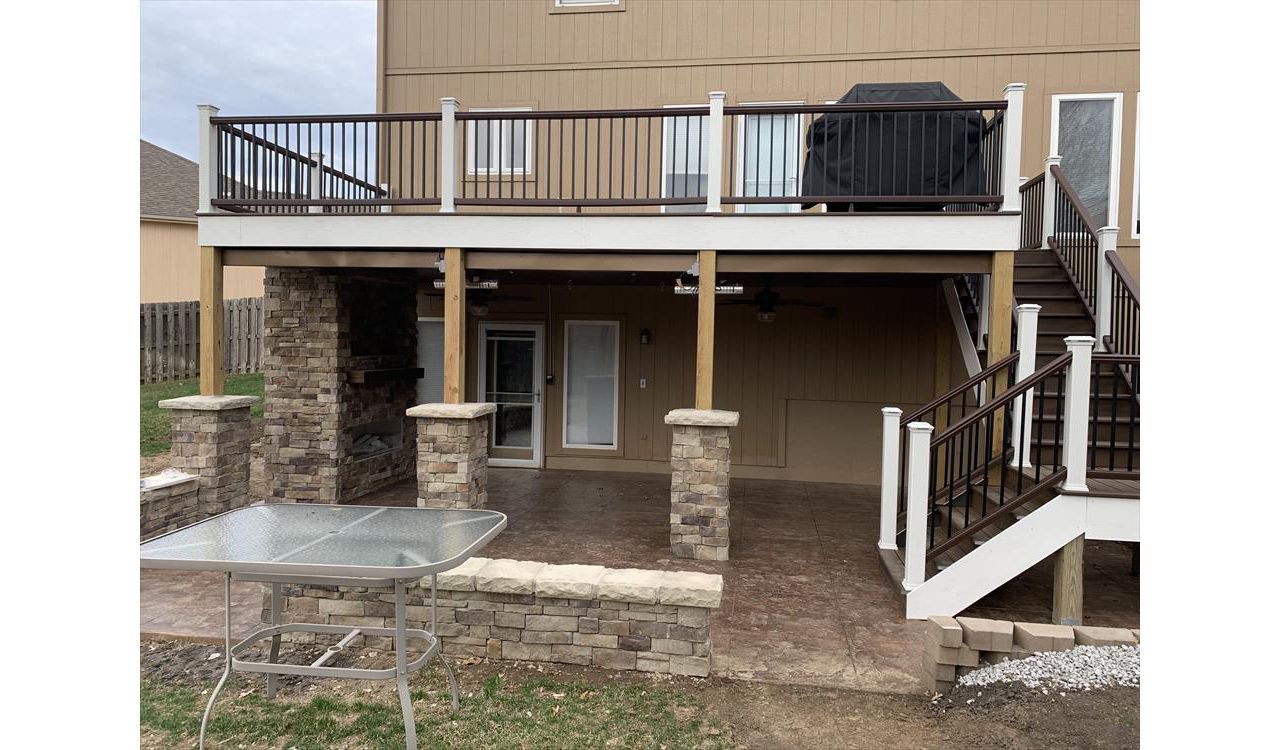 Trex Transcend Tropical (Spiced Rum) Deck with Trex Railing, Fascia and Lights - View of deck from straight on