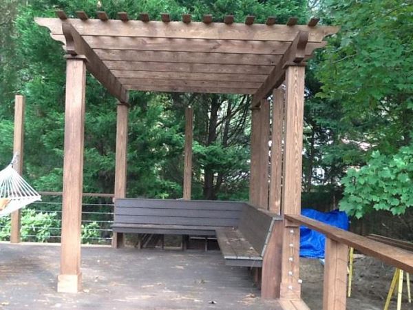 Pergola and bench provides an area for relaxing