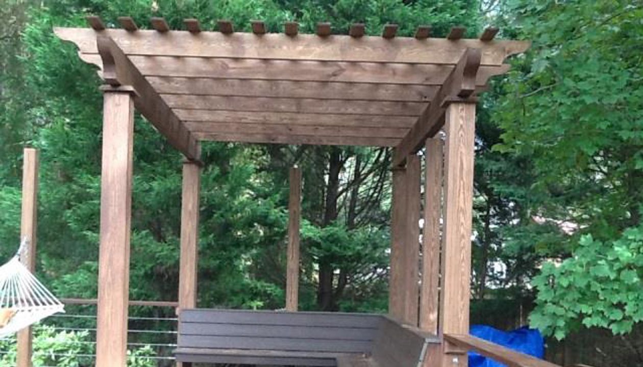 Pergola and bench provides an area for relaxing