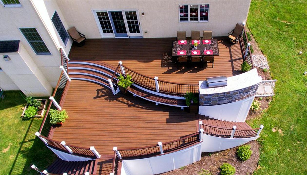 Trex Transcend Spiced Rum and Lava Rock deck with custom benches.