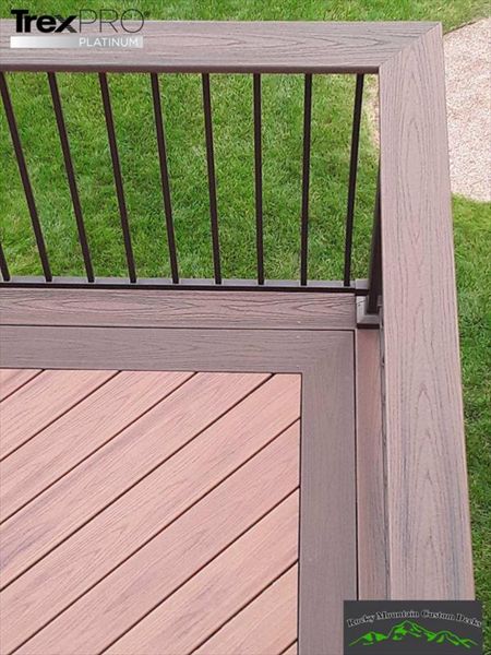 Trex Transcend Tiki Torch deco with Lava Rock border.