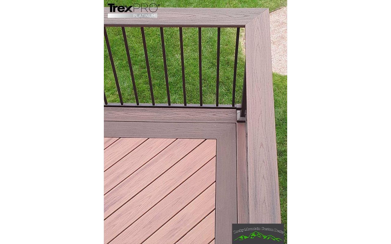 Trex Transcend Tiki Torch deco with Lava Rock border.