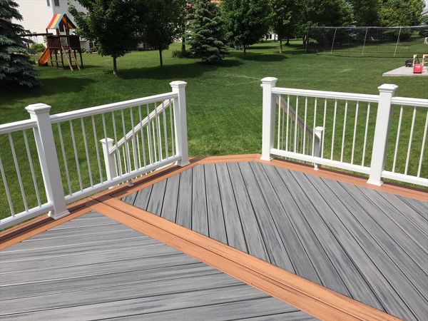 Trex Transcend Island Mist Deck with Tiki Torch Border and Trex Transcend Railing with Aluminum Balusters Rochester MN