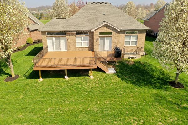 Trex Beach dune and Saddle mix with metal railing.