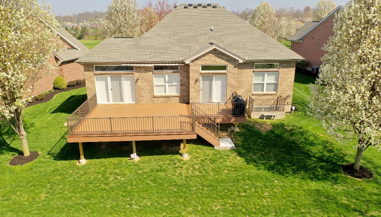 Trex Beach dune and Saddle mix with metal railing.
