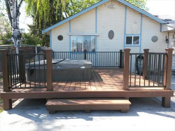 Transcends Decking: Tiki Torch &amp; Bronze Reveal Railing with Vintage Lantern Posts