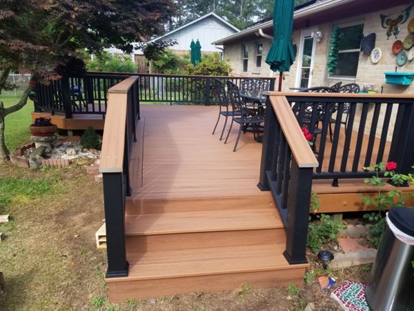 Westmoreland Deck: Tiki Torch decking, Charcoal black rails with Tiki Torch cocktail rail