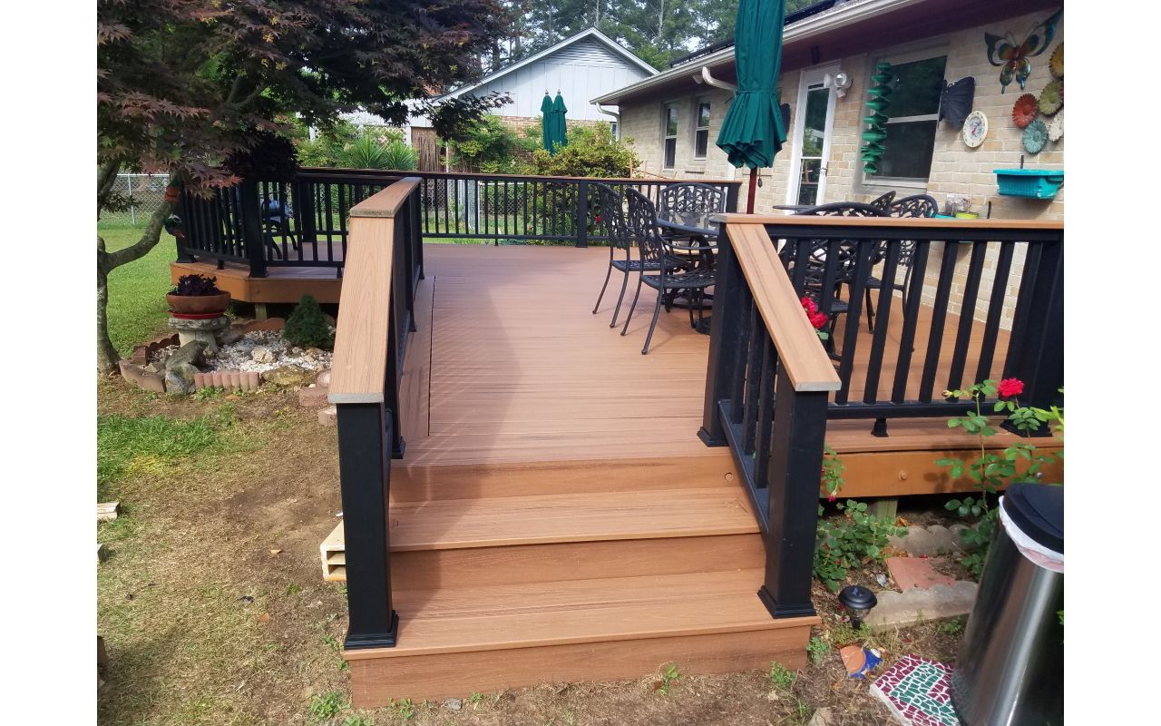 Westmoreland Deck: Tiki Torch decking, Charcoal black rails with Tiki Torch cocktail rail