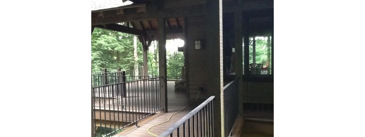 These black iron rails had to be re-painted unlike the Trex Spiced Rum decking
