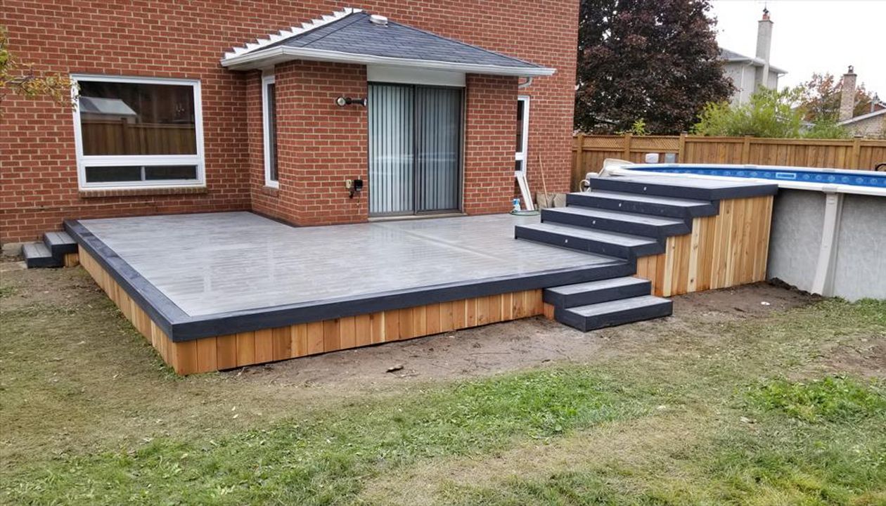 Grey Composite Decking using Select Pebble Grey with Winchester Grey trim - Orangeville, Caledon, Alliston, Bolton