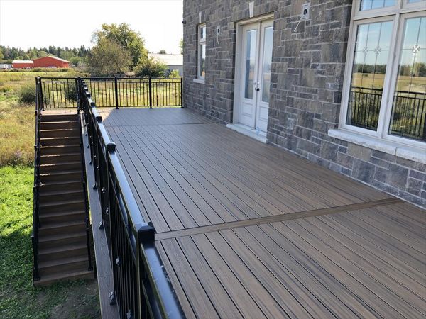Trex Havana Gold backyard deck done by Royal innovation
