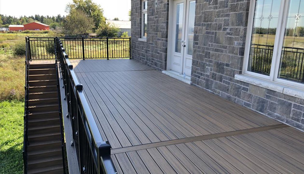 Trex Havana Gold backyard deck done by Royal innovation