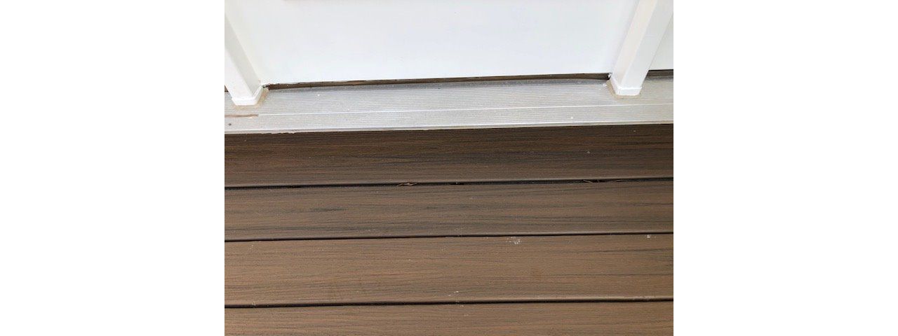 Another example of custom carpentry with the trim underneath the door threshold