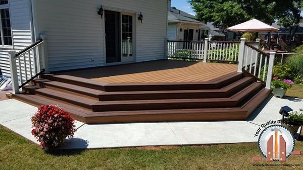 Tiki Torch body with Lava Rock border in Hackensack, NJ