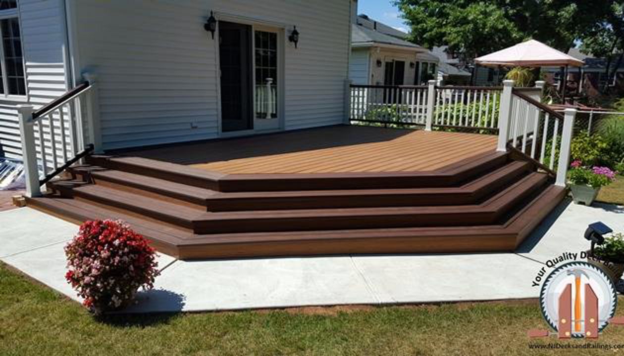 Tiki Torch body with Lava Rock border in Hackensack, NJ