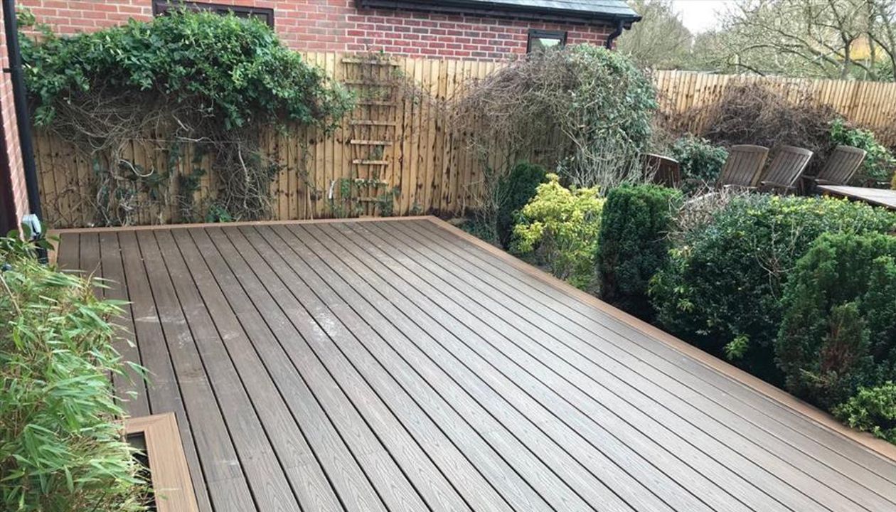 Existing wooden decking was removed and replaced with Spiced Rum with a Torino Brown picture frame. The decking can now be used all year round.