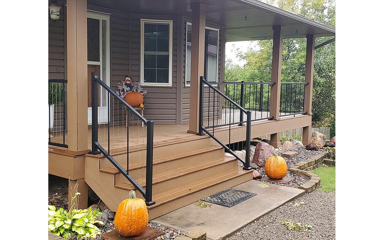 Trex Composite Enhance Basics Decking in Beach Dune color with Trex Select Decking in Saddle color for the Borders/Stairs in Forest Lake, MN area