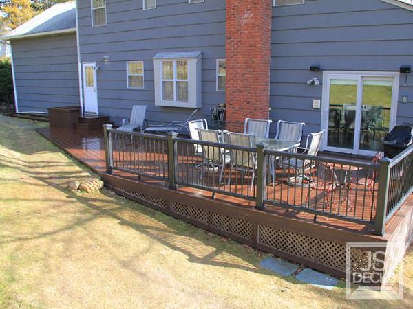 Lava Rock decking with Black Railing and chocolate lattice
