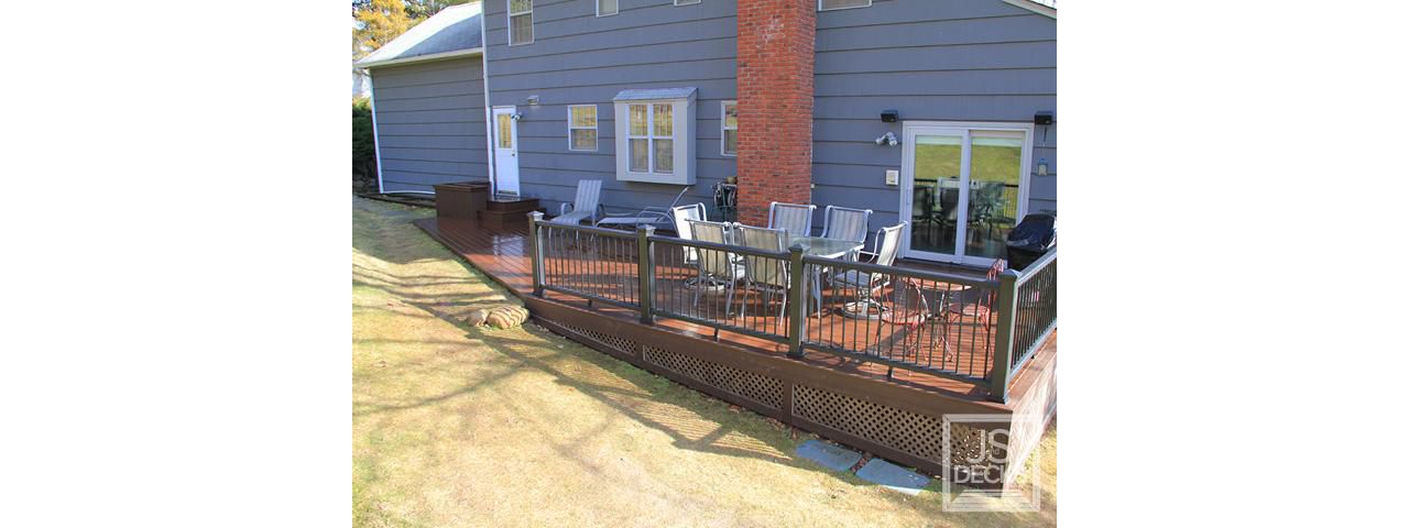 Lava Rock decking with Black Railing and chocolate lattice