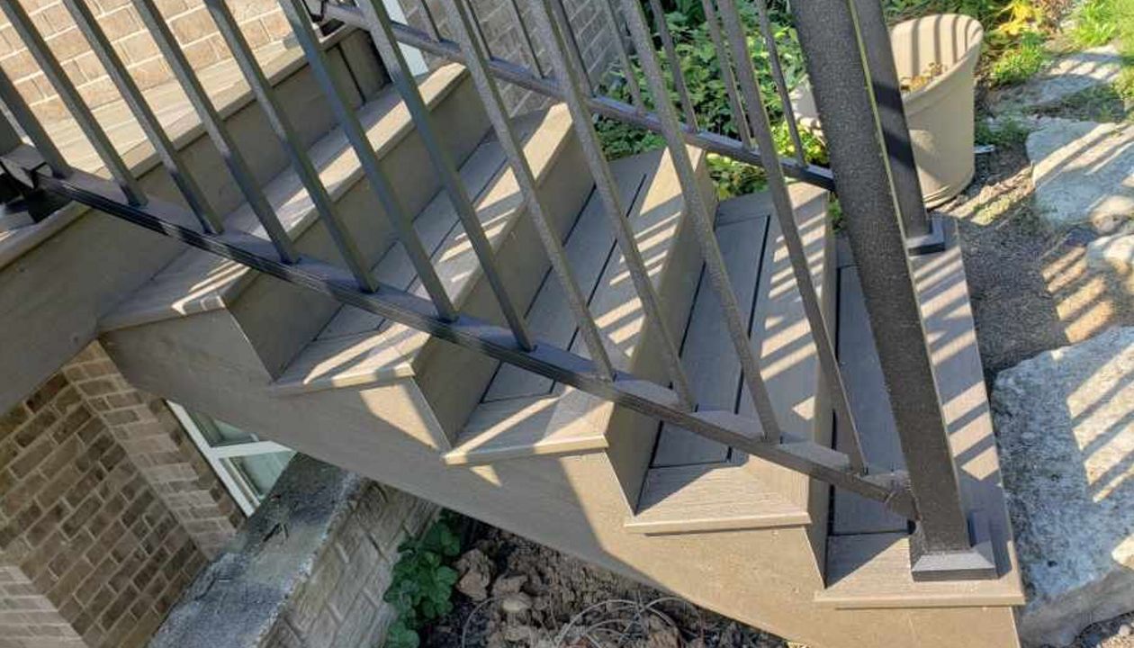 Trex Deck in Toasted Sand with Signature Rail.