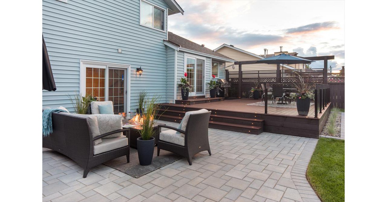 Trex Transcend Lava Rock with LED deck lighting, fire table and topless glass railings. Project location Pitt Meadows BC