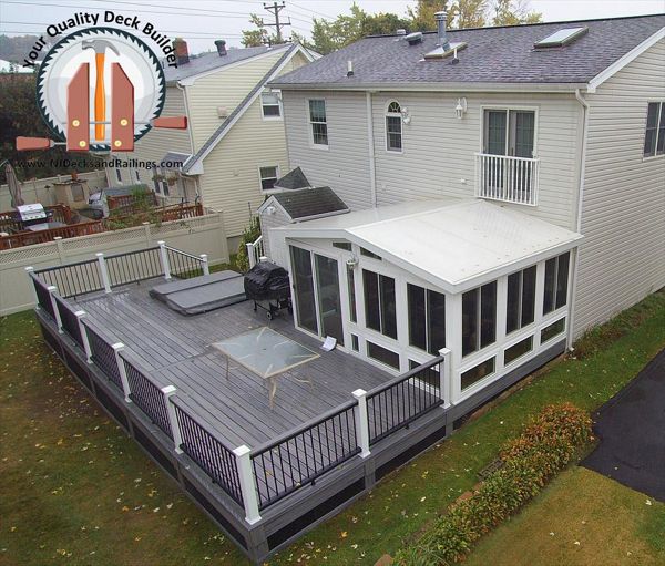 Island Mist Decking with black aluminum balusters and Gravel Path Cocktail Rail in Wallington, NJ
