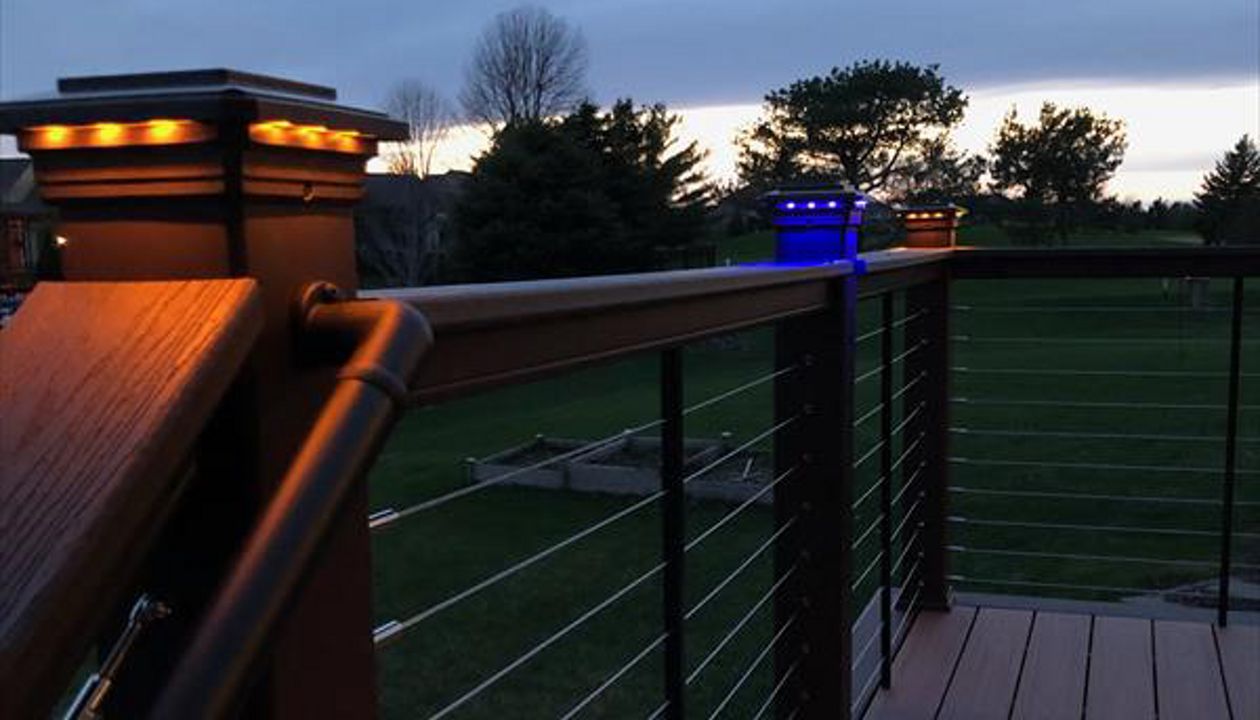 Trex Transcend Tropics Tiki Torch deck boards with Transcend Vintage Lantern Rails, fascia serving the Twin Cites, Post cap lights, deck lighting, picture frame, drink rail, hidden fasteners, Hastings, Woodbury, Egan, Edina, Minneapolis, Lake of the Isles
