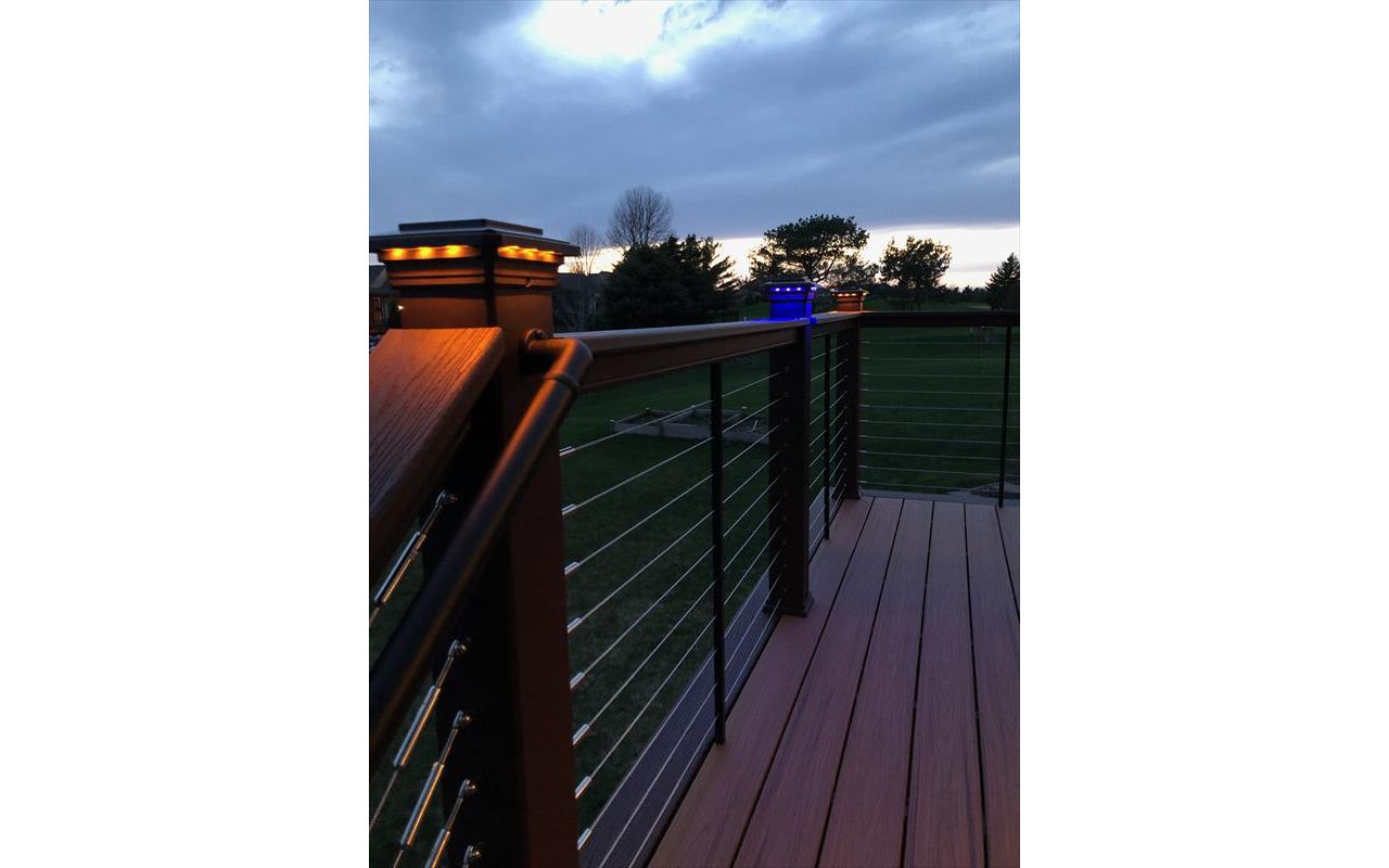 Trex Transcend Tropics Tiki Torch deck boards with Transcend Vintage Lantern Rails, fascia serving the Twin Cites, Post cap lights, deck lighting, picture frame, drink rail, hidden fasteners, Hastings, Woodbury, Egan, Edina, Minneapolis, Lake of the Isles