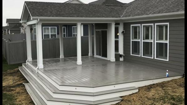 Covered Trex porch in Greenwood. Island mist with White fascia