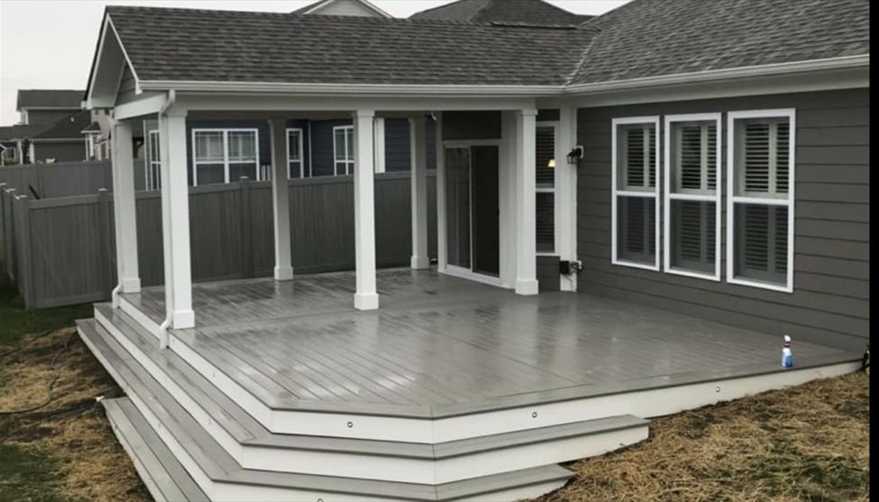 Covered Trex porch in Greenwood. Island mist with White fascia