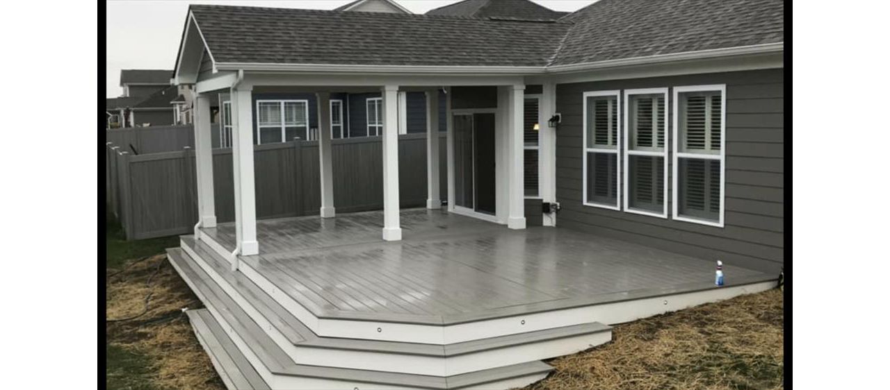 Covered Trex porch in Greenwood. Island mist with White fascia