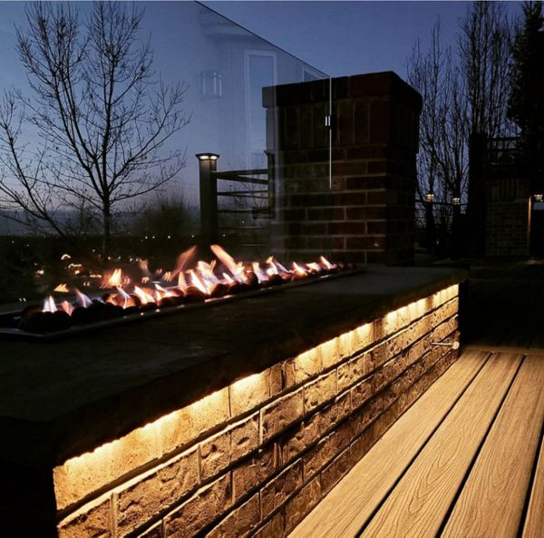 Denver, CO Trex Deck featuring Trex Transcend Tiki Toch decking and custom fire feature