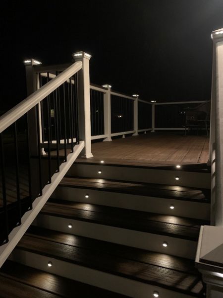 Deck and stairs with lighting at night