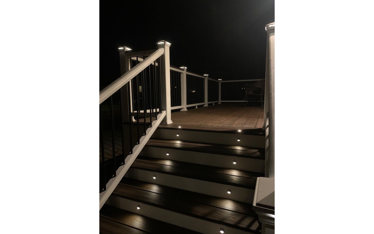 Deck and stairs with lighting at night