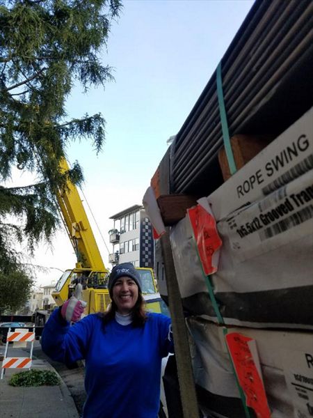 Monica of Fine Line poses with Trex for Oakland Penthouse, crane at the ready!