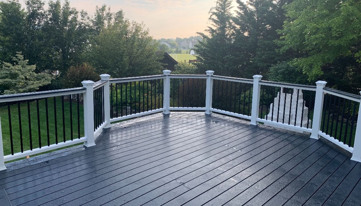 Completed Trex Winchester Gray Deck with Transcend rail ,square alum. balusters and top deck rail