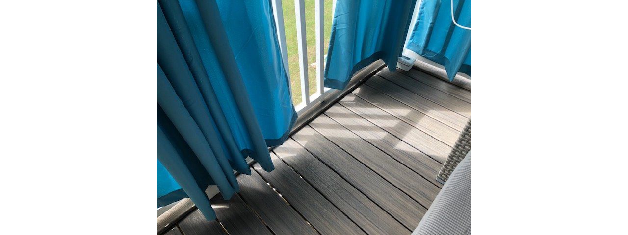 To add an extra aesthetic to this project, we trimed out the Trex Enhance Naturals Rocky Harbor decking with a ripped board on its surface