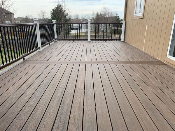 Trex Transcend Tropical (Spiced Rum) Deck with Trex Railing, Fascia and Lights - View from on top of deck