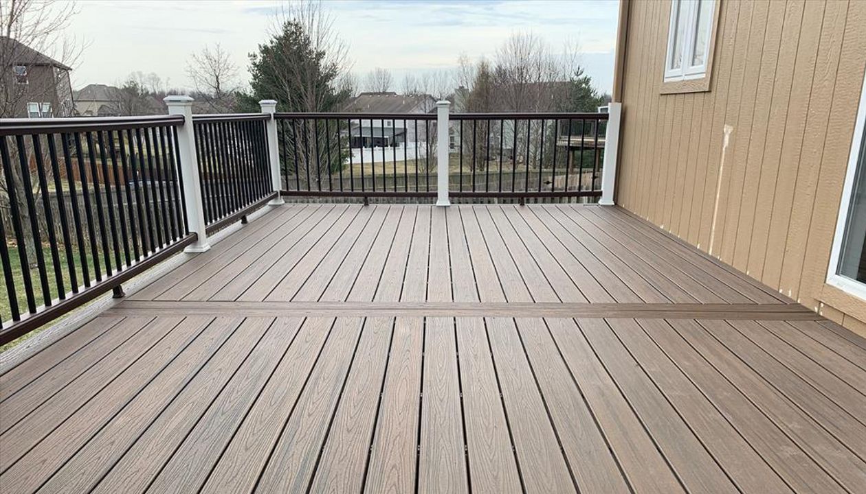 Trex Transcend Tropical (Spiced Rum) Deck with Trex Railing, Fascia and Lights - View from on top of deck