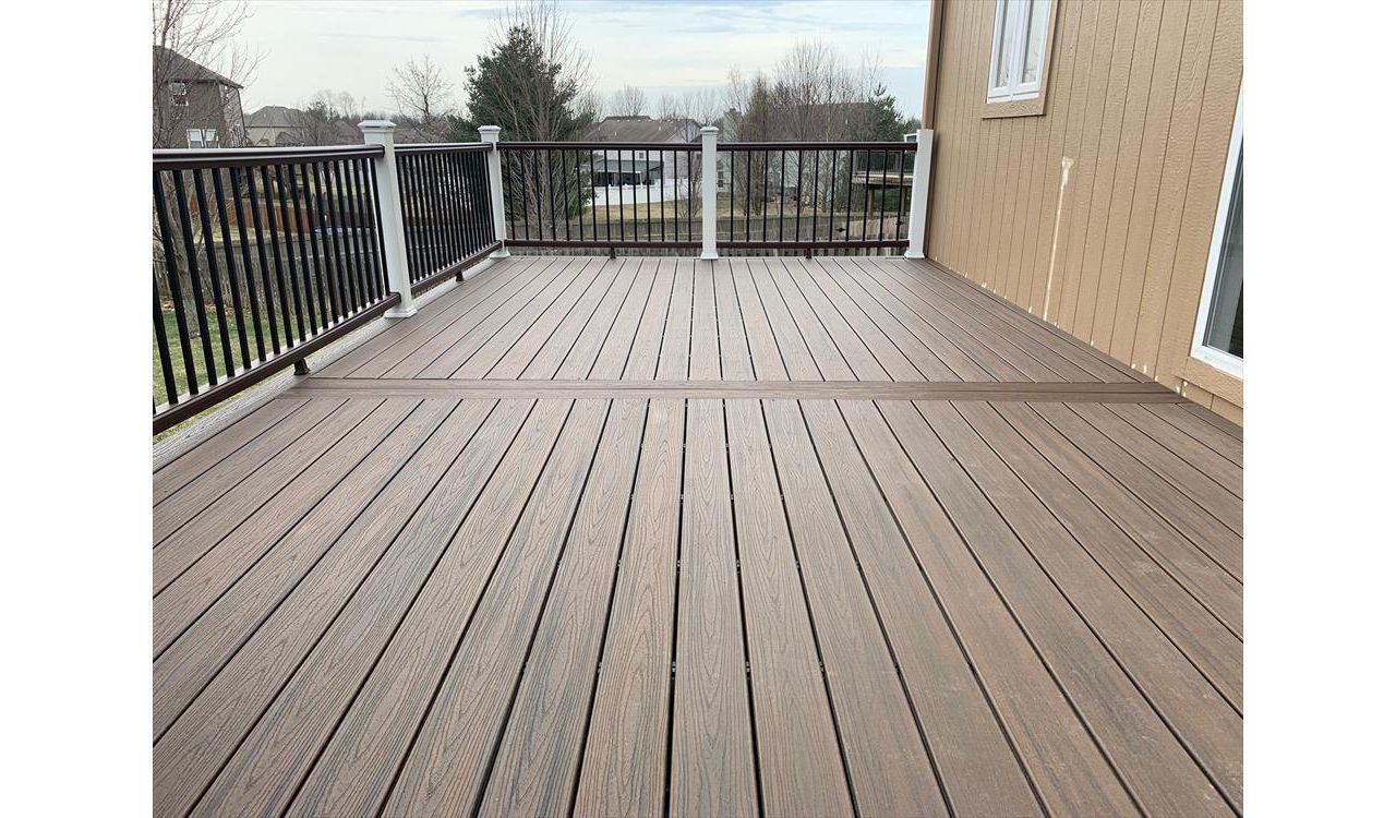 Trex Transcend Tropical (Spiced Rum) Deck with Trex Railing, Fascia and Lights - View from on top of deck