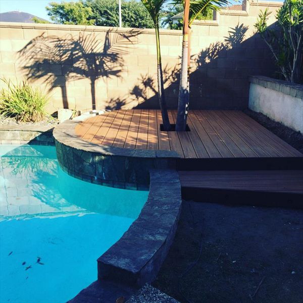 Tiki Torch with Palm Tree Poolside!