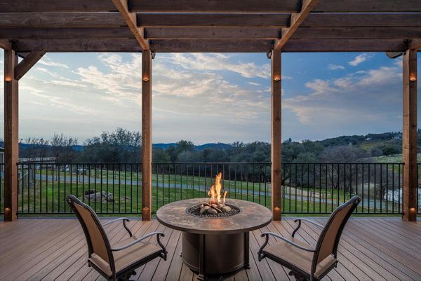 Spiced Rum Decking and rough redwood pergola