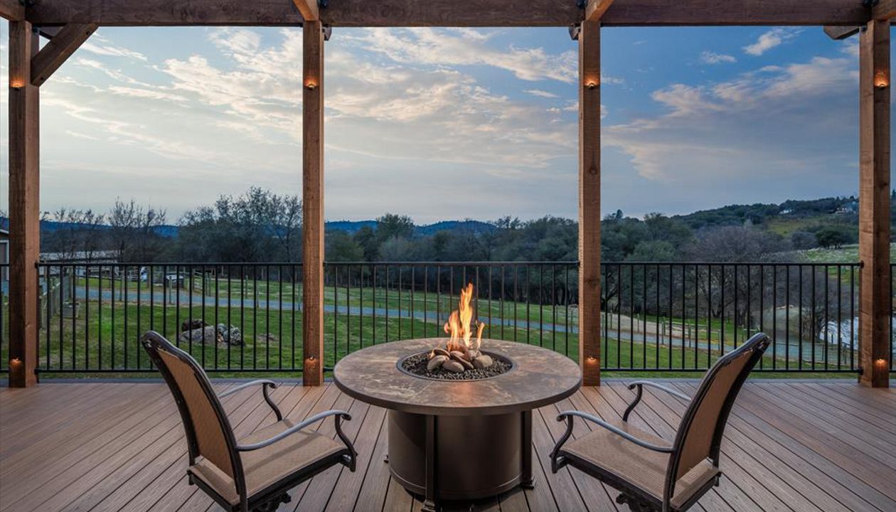 Spiced Rum Decking and rough redwood pergola