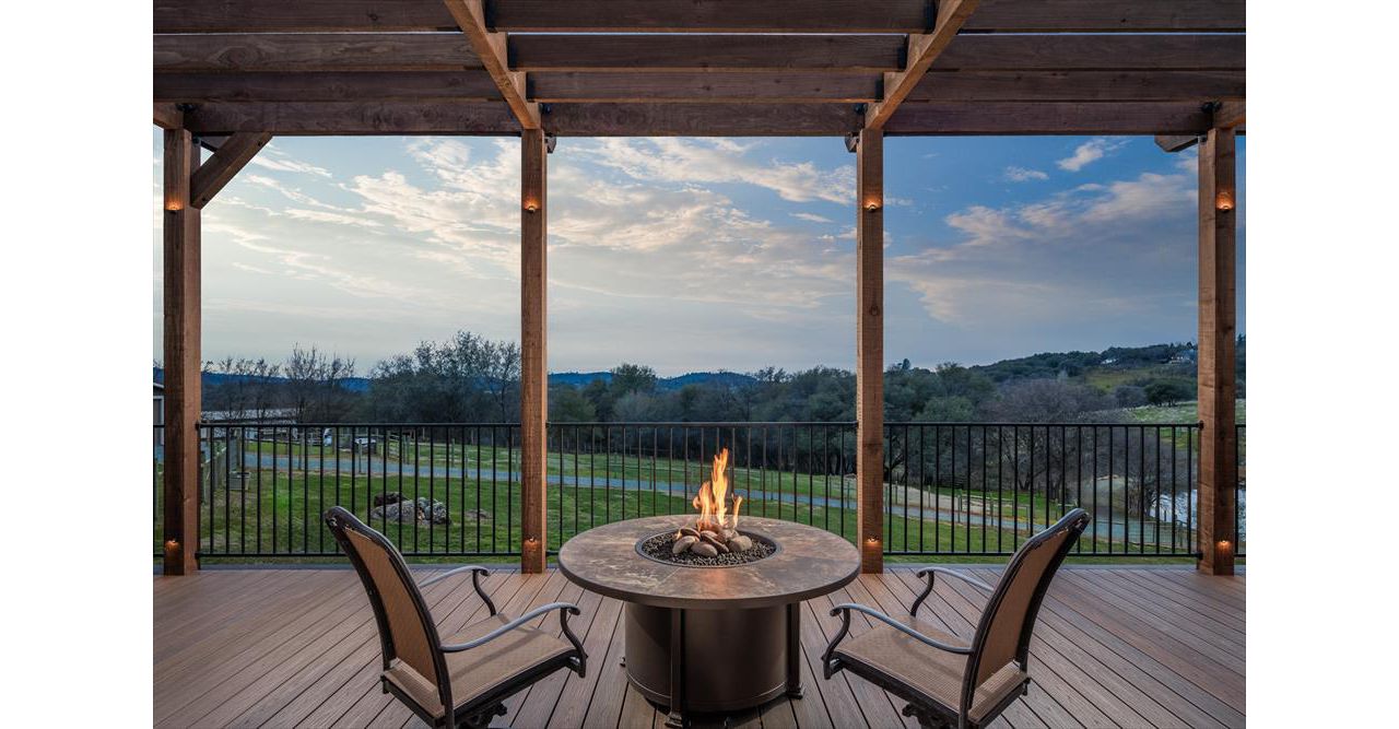 Spiced Rum Decking and rough redwood pergola