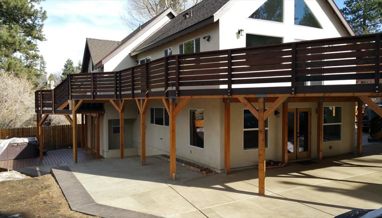 Trex facia and trim on this new deck. Trex as siding over chimney and gables.